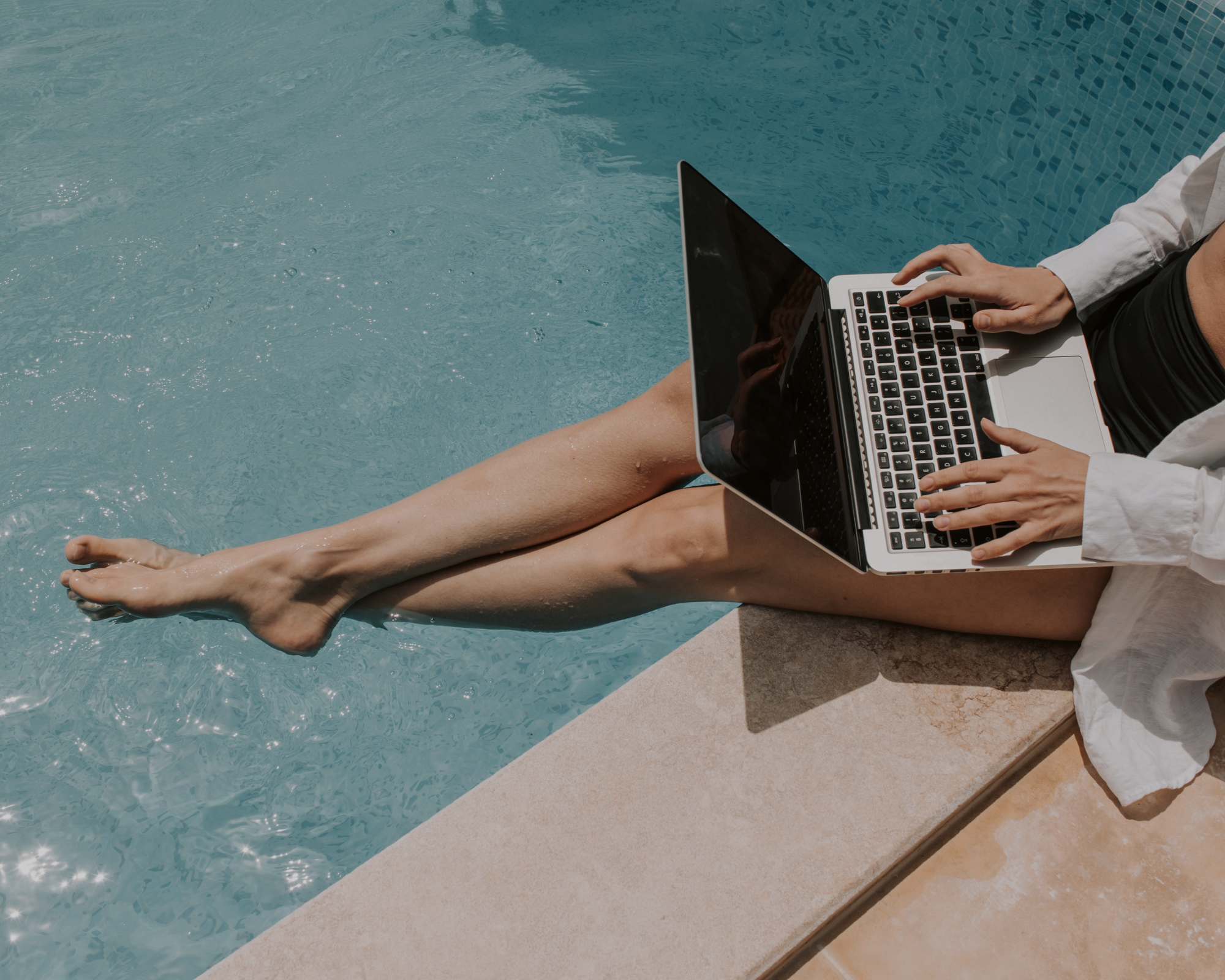 poolside with laptop